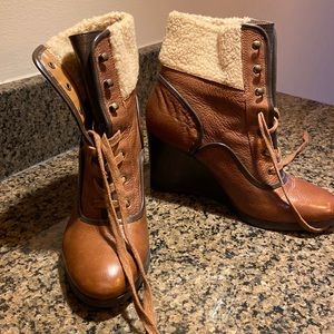 Brand new never been worn leather Sherpa wedge booties. Size 8 1/2 Franco Sarto